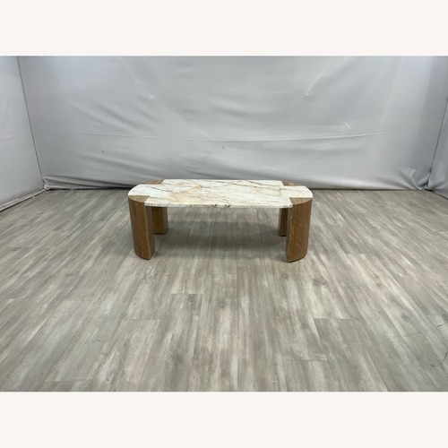 Used Lulu and Georgia Mahoe Oval Coffee Table for sale on AptDeco