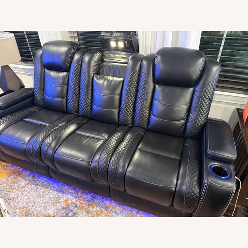 Used Ashley Furniture Black Leather Loveseat for sale on AptDeco