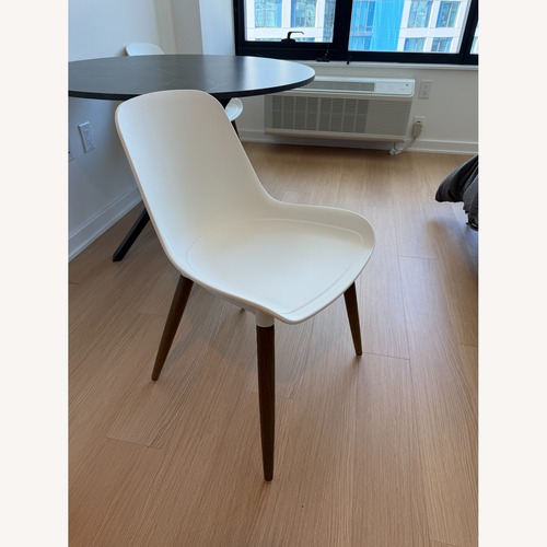 Used IKEA Gronsta White Plastic Dining Chairs for sale on AptDeco