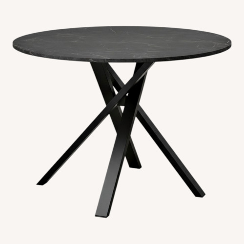 Used IKEA Mariedamm Black Wood Dining Table for sale on AptDeco