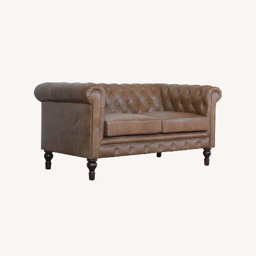 Used Two-Seater Leather Sofa with Tufted Detailing for sale on AptDeco