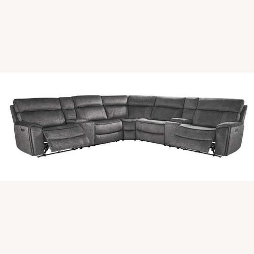 Used Rooms To Go  Dark Gray Fabric 3+ Piece Sectional for sale on AptDeco