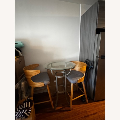 Used Natural Glass Dining Set for sale on AptDeco