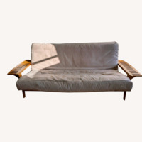 Queen-size futon with folding end tables