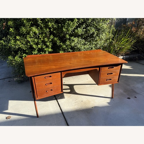 Used Svend Madsen Danish Modern Curved Teak Desk  for sale on AptDeco