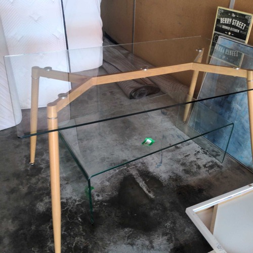 Used Glass Top Dining Table on Metal Base	 for sale on AptDeco