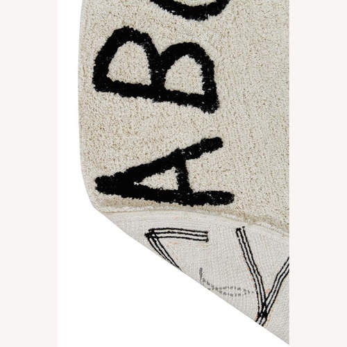 Used White Cotton Area Rug 6' x 9' for sale on AptDeco