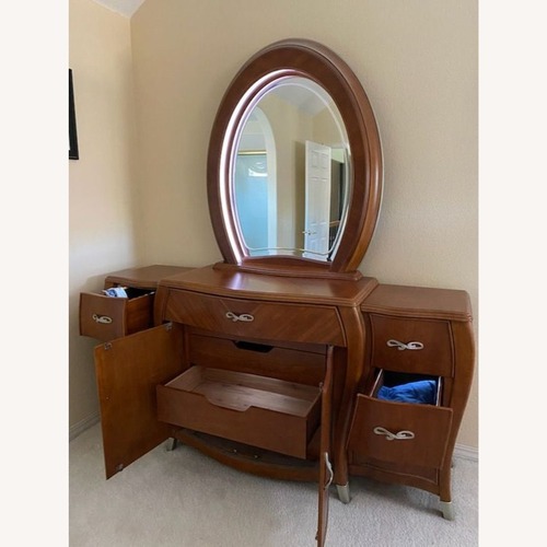 Used Michael Amini Elegant Wood Dresser with Mirror  for sale on AptDeco