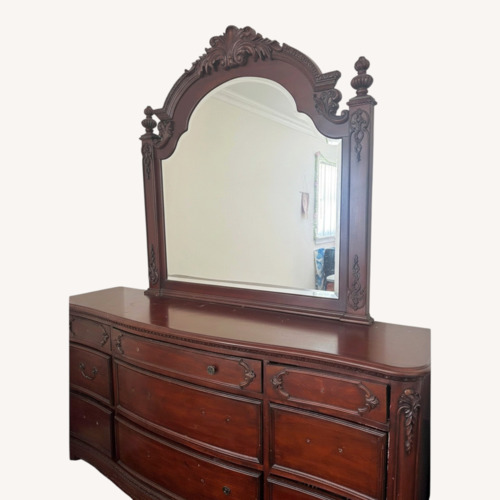 Used Solid Furn Dark Brown Wood Dresser for sale on AptDeco