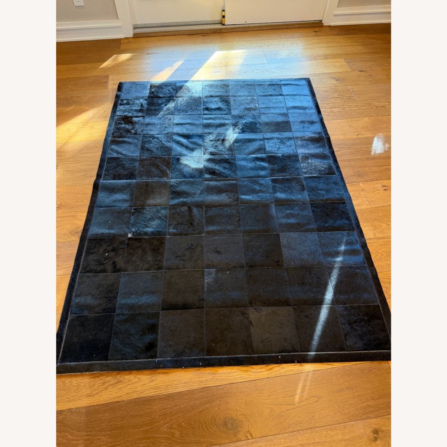 Restoration Hardware 5' x 7' Patchwork Cowhide Rug - image-1