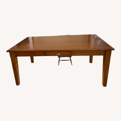 Used Pottery Barn Parker Honey Oak Dining Table for sale on AptDeco