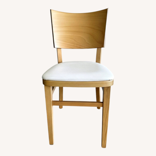 Used Wood Dining Chairs with White Leather Seats for sale on AptDeco