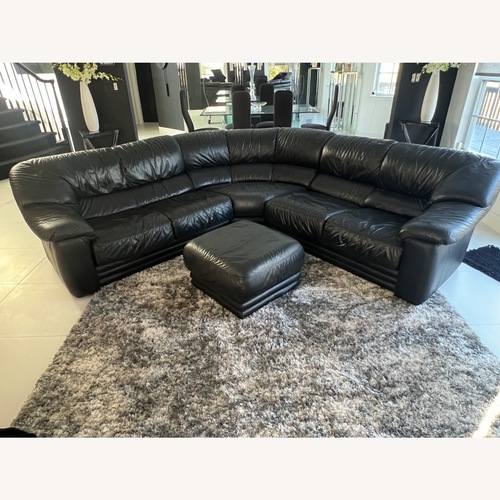 Used Natuzzi  Black Leather 3+ Piece Sectional for sale on AptDeco