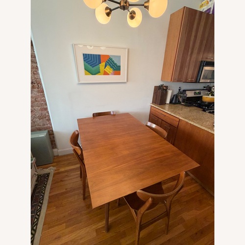 Used West Elm Light Brown Wood Dining Table for sale on AptDeco