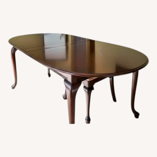 Used Ethan Allen Dark Brown Wood Dining Table for sale on AptDeco