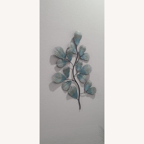 Used Walmart Blue Metal Wall Decor for sale on AptDeco