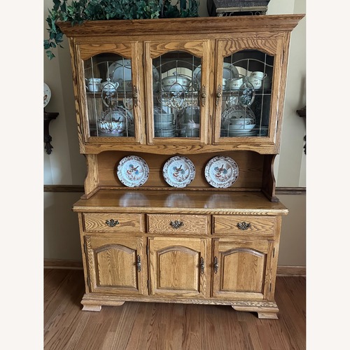 Used Solid Oak Lighted China Cabinet for sale on AptDeco