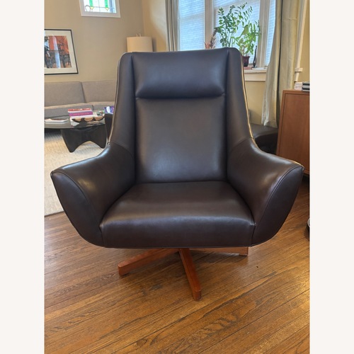 Used Room & Board Charles Swivel Chair + Ottoman for sale on AptDeco