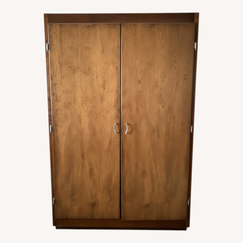 Used Vintage Jumbo Wood Armoire for sale on AptDeco