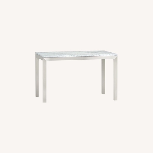 Used Crate & Barrel Parsons White Marble Dining Table for sale on AptDeco
