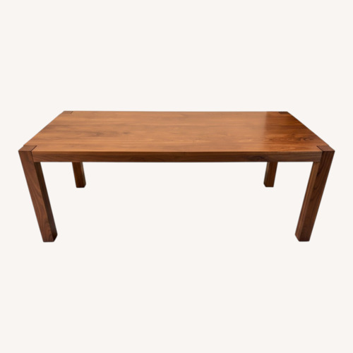 Used De La Espada Solid Walnut Dining Table for sale on AptDeco