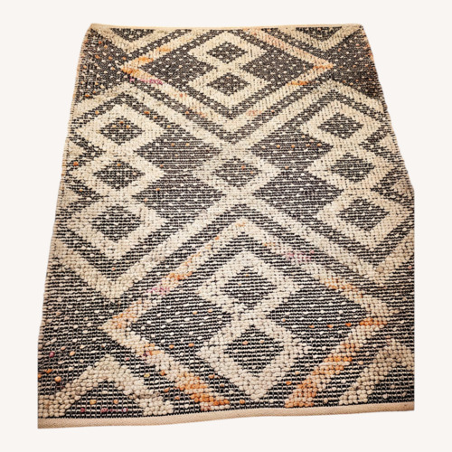 Used Pottery Barn Natural Wool Blend Area Rug 4' x 6' for sale on AptDeco