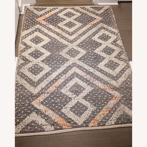 Used Pottery Barn Natural Wool Blend Area Rug 4' x 6' for sale on AptDeco