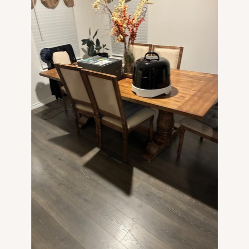 Used Natural Wood Dining Set for sale on AptDeco