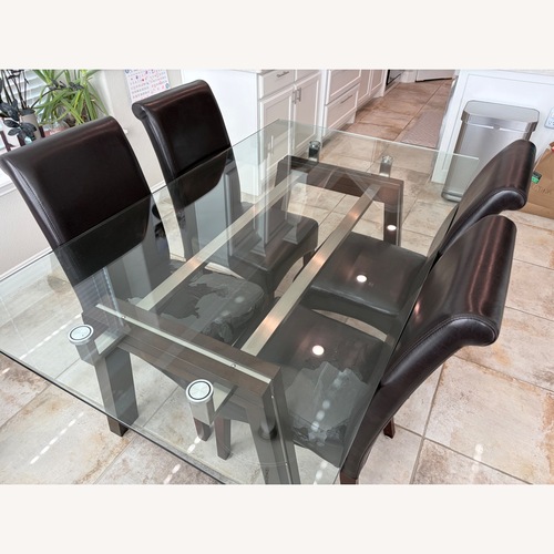 Used Glass and Dark Brown Modern Dining Table  for sale on AptDeco