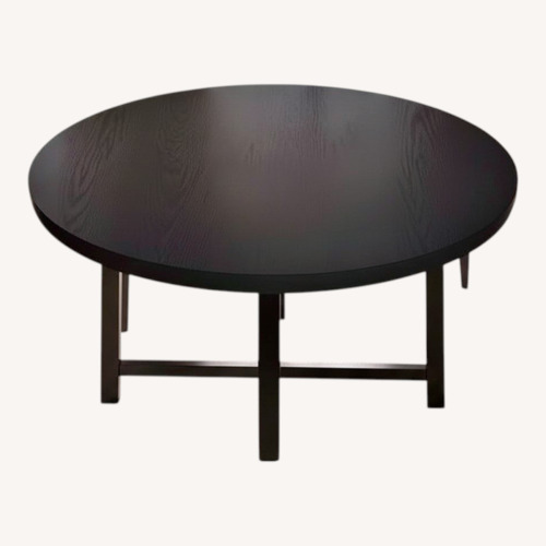 Used Black Wood Dining Table for sale on AptDeco