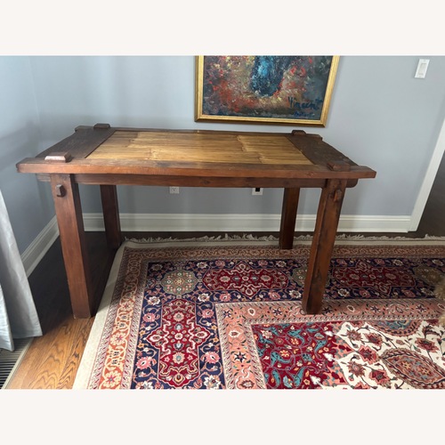 Used ABC Carpet and Home Dark Brown Wood Dining Table for sale on AptDeco