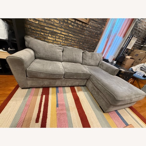 Used Raymour & Flanigan Light Gray 2 Piece Sectional for sale on AptDeco