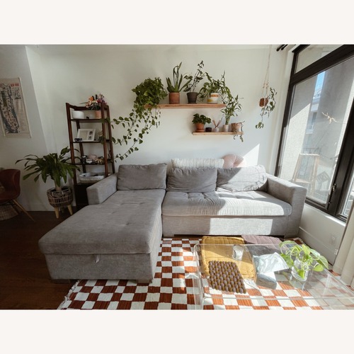 Used Article Soma Gray Left Sleeper Sectional w Storage & Sofa Bed for sale on AptDeco