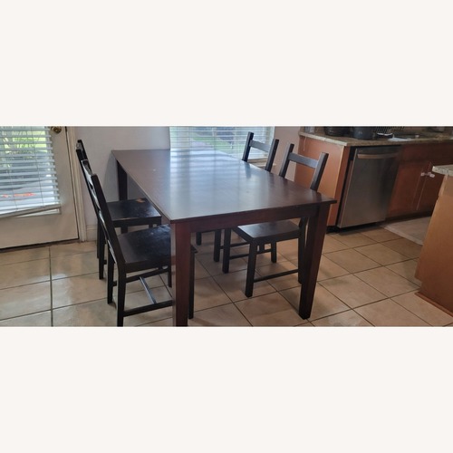 Used Better Homes and Gardens Dark Brown Dining Table for sale on AptDeco