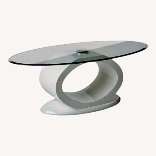 Used Mid Century Modern Oval Glass Coffee Table  for sale on AptDeco