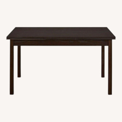 Used Scandinavian Designs Dinex Black Wood Dining Table for sale on AptDeco