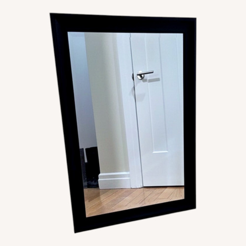 Used Black Wood Wall Mirror for sale on AptDeco