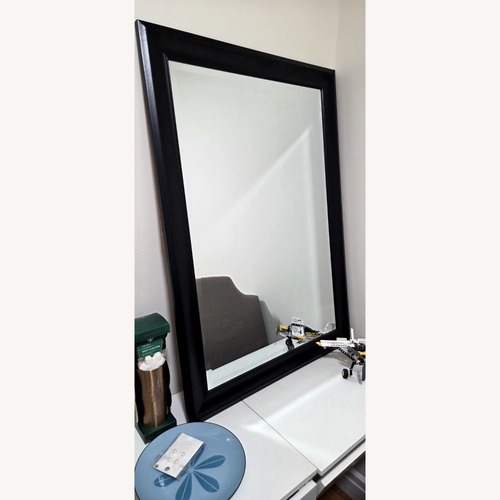 Used Black Wood Wall Mirror for sale on AptDeco