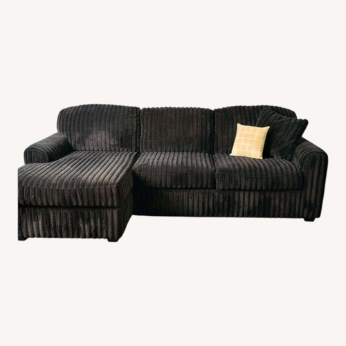 Used Signature Design Black 2 Piece Sectional for sale on AptDeco