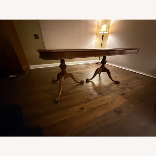 Used Vintage/Antique Dark Brown Dining Table for sale on AptDeco