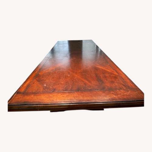 Used Vintage Dark Brown Solid Wood Dining Table for sale on AptDeco