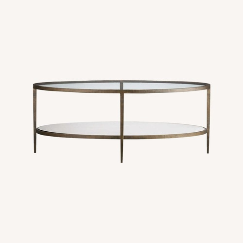 Used Crate & Barrel Clairemont Oval Coffee Table for sale on AptDeco