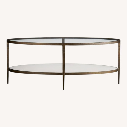 Used Crate & Barrel Clairemont Oval Coffee Table for sale on AptDeco
