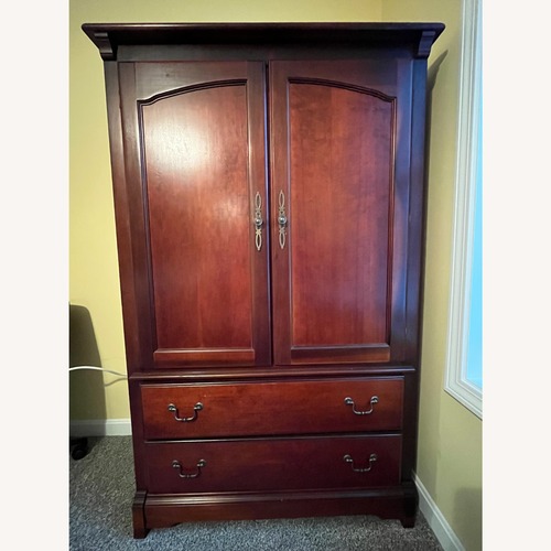 Used Cherry Wood Armoire for sale on AptDeco