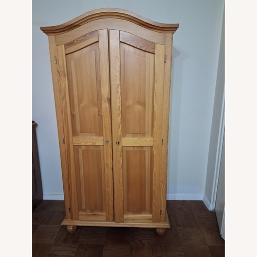 Used Progress Lighting Armoire for sale on AptDeco