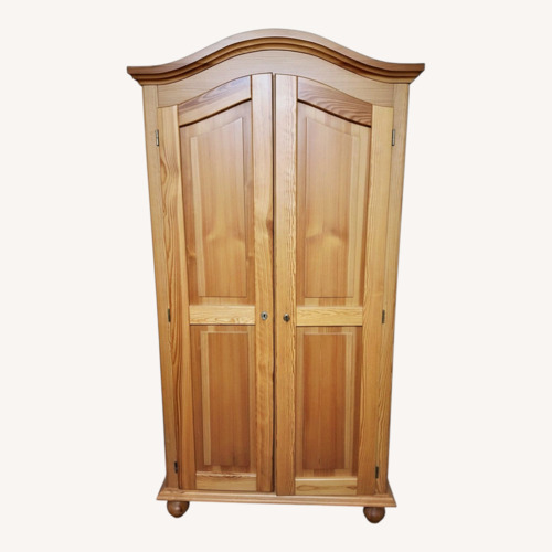 Used Progress Lighting Armoire for sale on AptDeco