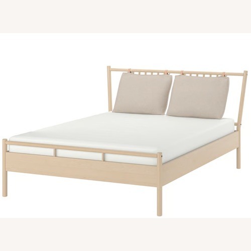 Used IKEA Björksnäs Natural Wood Queen Bed for sale on AptDeco