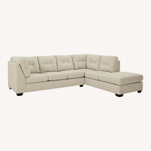 Used Ashley Furniture 5 Piece Sectional incl Ottoman for sale on AptDeco