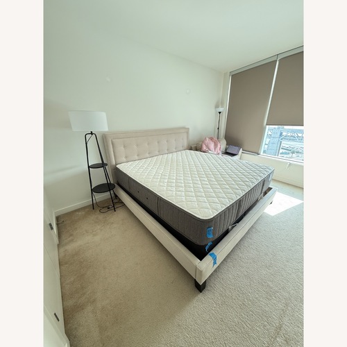 Used Macy's White/Cream Fabric King Bed for sale on AptDeco