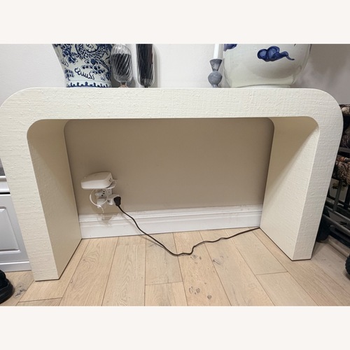 Used CB2 Crescent 52" Ivory Resin Console Table for sale on AptDeco